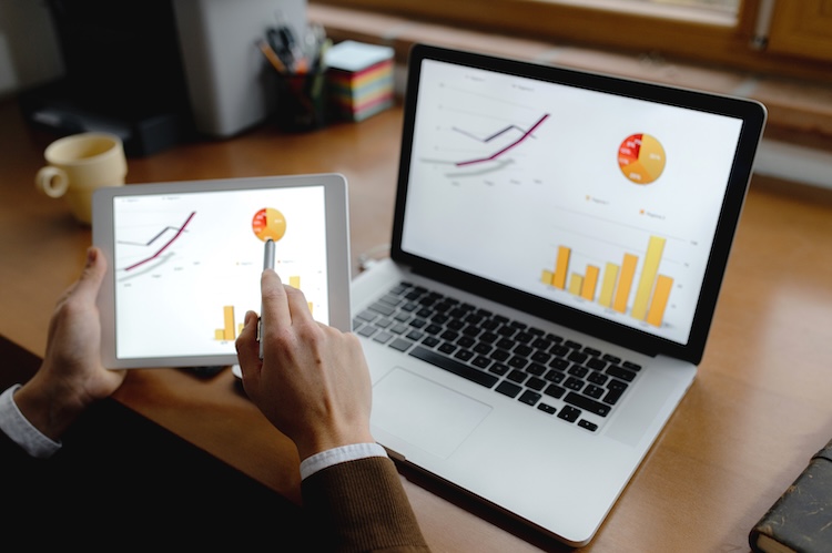 SEO specialist analyzing website traffic, keyword performance and digital marketing data